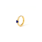 Gold hoop earring with a blue gemstone on a white background