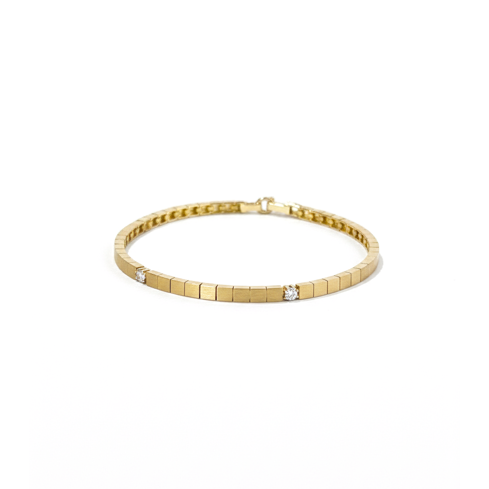 Square and Stone Bangle | 18-karat gold and high quality cubic zirconia stones.