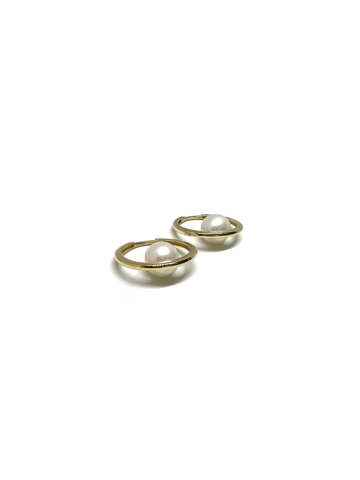 Circle Hoops with Pearls | 18-karat gold and cultured pearls. Circle Hoops with Pearls | 18-karat gold and cultured pearls.