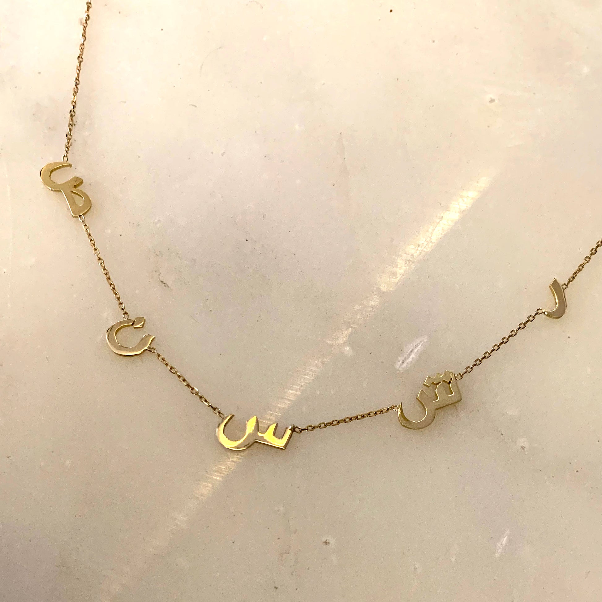 letters and shapes necklace