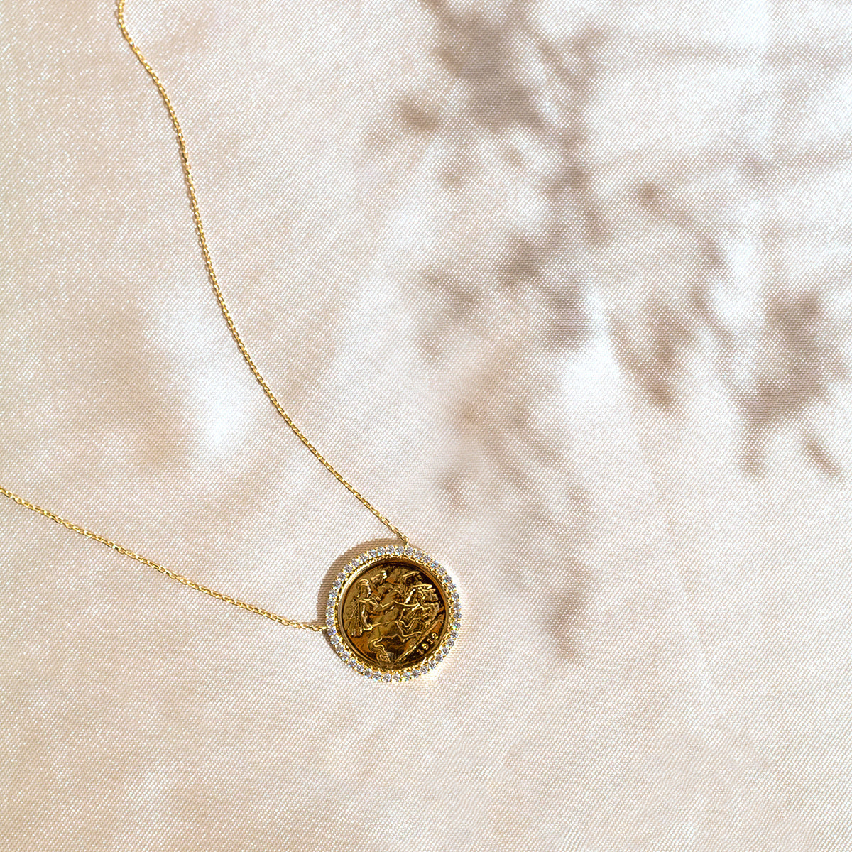 half lira necklace