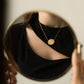 half lira necklace