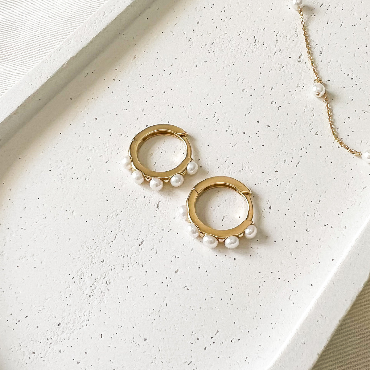 Pearly Hoops | 18-karat gold and cultured pearls. Pearly Hoops | 18-karat gold and cultured pearls.